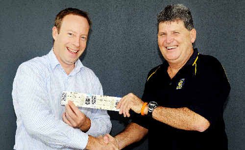 Neil Worth (right) receives his Grand Final tickets from the Chronicle’s general manager, Jon Steel. Neil Worth (right) receives his Grand Final tickets from the Chronicle’s general manager, Jon Steel.